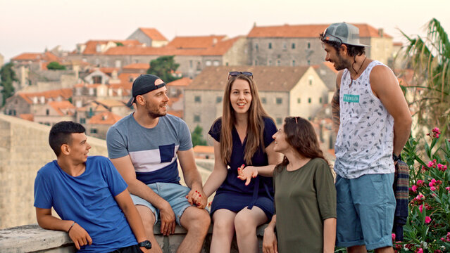 Young Diverse Group Of Friends Having Fun And Taking Photos On A Road Trip Through Europe Travel Lifted Happiness And Destination Exploration Tourism As A Family Together Love Summer Concept