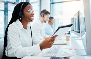 Contact us, customer support and happy call center consultant working in office, smiling while helping clients. Young professional female enjoying provide good online or virtual service and advice