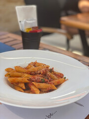 Plate with pasta with bolognese sauces