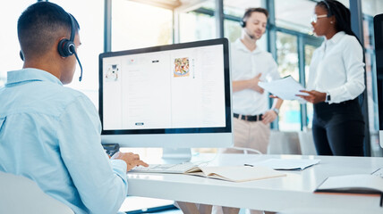 Fototapeta premium Call center worker talking to people on computer, help with consultant at telemarketing company and support from online consultant in office at work. Customer service employee working in sales