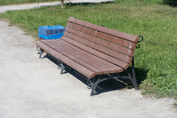 bench  in park at dry sunny summer day