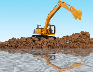 Crawler excavator is digging with lift up in the construction site  ,water reflection shadow  on blue background
