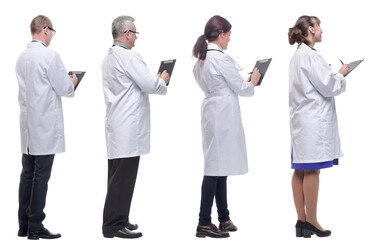 group of doctors standing with their backs isolated on white