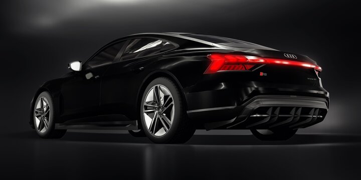 Paris, France. January 25, 2022: Audi E-Tron GT 2021. Premium sports sedan. Car isolated on black background. 3d rendering.