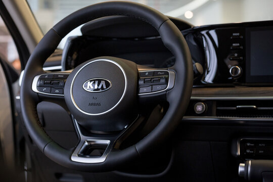 Russia, Izhevsk - December 28, 2020: KIA showroom. Steering wheel and interior of new K5 car business class.