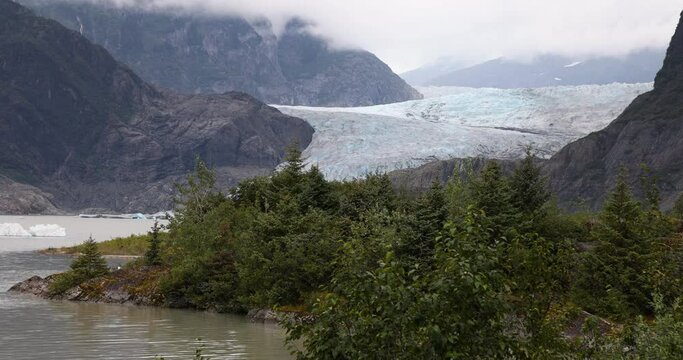 Mendenhall Glacier Juneau Alaska. Climate change global warming result is rapidly retreating, shrinking, and melting.