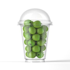 Plastic cup with green tomatoes