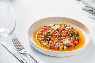 salmon tartar with avocado and herbs