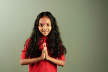 Little Indian child with lord ganesha