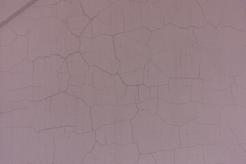 Background - cracked faded purplish brown painted wall