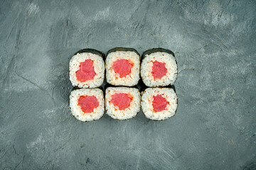 Maki sushi roll with tuna on a gray background. Selective Focus. Sushi Menu