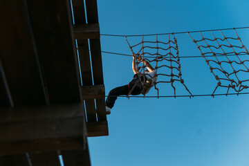 Male climber in the adventure park