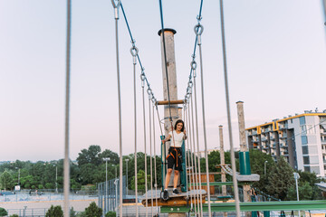 Teenage girl in an adventure park