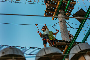 Young woman in the adventure park
