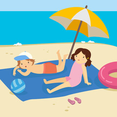 boy and girl sunbathing on a blue rug