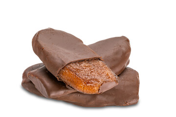 Pile of homemade chocolate dipped solar dried ripe flat banana isolated on white background with clipping path.