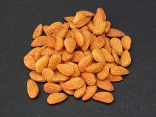 Almonds on black background 