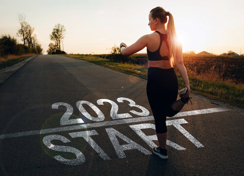 Sports girl who wants to start the new year 2023. Concept of new professional achievements in the new year and success. New Year 2023 with new ambitions, challenge, plans, goals and visions. 