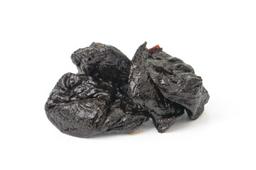 Closeup dried prunes fruit isolated on white background.