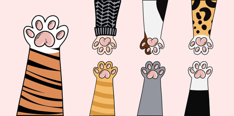 Vector illustration of seven cartoon cat paws. Tiger, Sphynx cat with sweater, wild and domestic cat paws. Doodle illustration sign