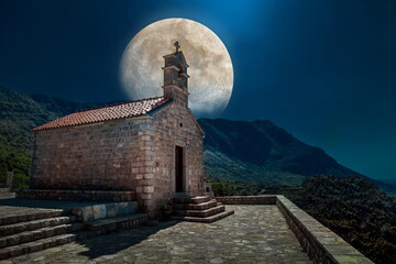 night view of full moon over the castle © Yuriy Kobets