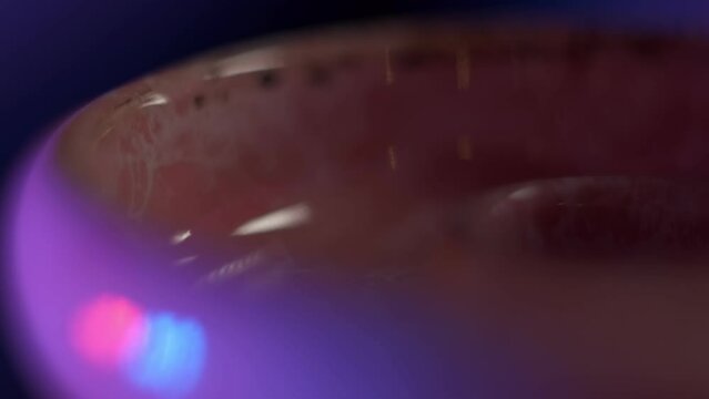 Closeup of putting Hookah tobacco into the bowl