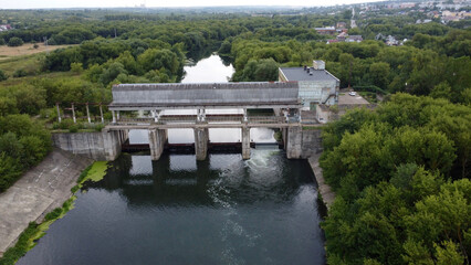 Fototapeta premium View of a dam on a small river.