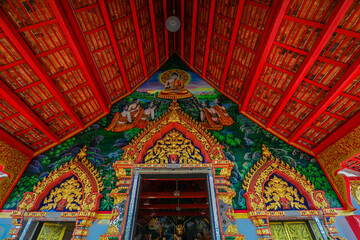 Fototapeta na wymiar The background of religious attractions in Lamphun Province (Wat Pa Tueng Ngam) is an old church on a mountain. People always come to make merit.