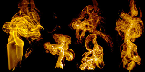 A set of isolated samples of orange smoke on a black background. Clouds and bizarre swirls of smoke or flames. Isolated.
