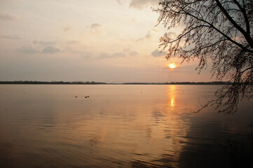 Fototapeta na wymiar Sunset reflection in a lake around Pasohlavky, South Moravia, Czech Republic.
