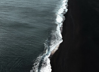 Vik Beach, or Reynisfjara, is Iceland's most famous beach and boasts insane basalt columns, lava...