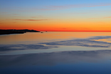 Fototapeta premium Stunning Sunset at Point Lynas looking towards Amlwych, Anglesey, North Wales, UK.