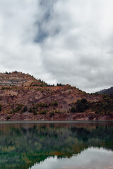 Vertical landscape photo of lake and mountain