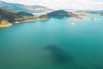 Aoos Springs Lake in the Metsovo in Epirus. mountains of Pindus in northern Greece. Techniti Limni Aoou Lake. Aerial view, top view, drone