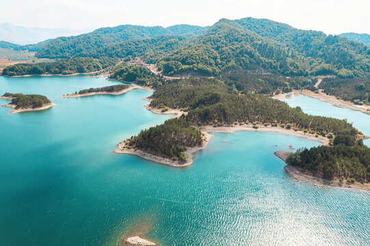 Aoos Springs Lake in the Metsovo in Epirus. mountains of Pindus in northern Greece. Techniti Limni Aoou Lake. Aerial view, top view, drone