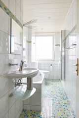 Empty bright bathroom in a rented apartment