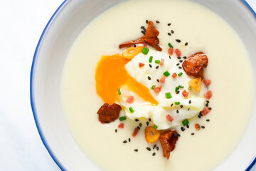 Potato parmentier with poached egg and mushrooms. Traditional Spanish haute cuisine tapas.