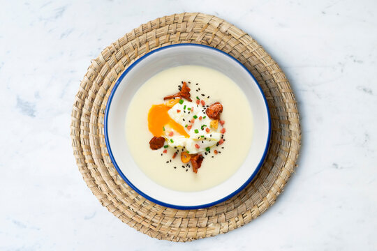 Potato parmentier with poached egg and mushrooms. Traditional Spanish haute cuisine tapas.