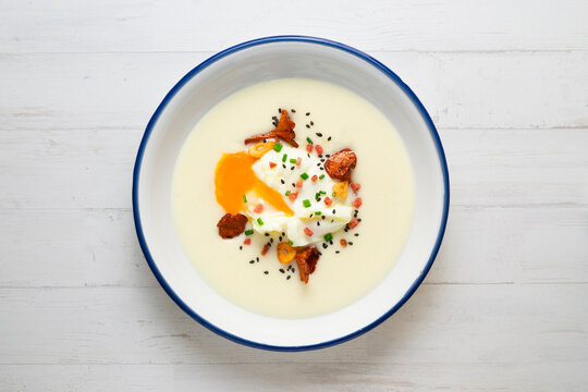 Potato parmentier with poached egg and mushrooms. Traditional Spanish haute cuisine tapas.