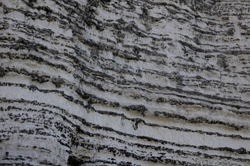 Close up on a cliff at Etretat. The characteristic zebra patterns are visible