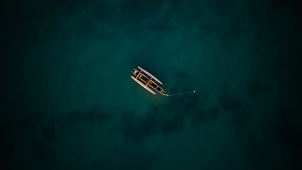 Boat in a green sea