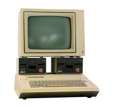 Munich, Germany, March 10, 2016: Apple II computer with foam-molded plastic case in BMW Welt museum. It was the first consumer product sold by Apple Computer designed by Steve Wozniak by 1977