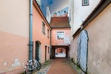 Fototapeta na wymiar Narrow street in old European town