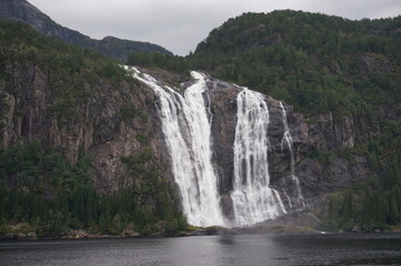 Fototapeta na wymiar Waterfall. North shore of Dalsfjorden, fjord in Vestland county, Norway.