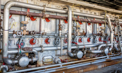 The valve on the factory equipment. Industrial compressors and industrial apparatus. Factory premises, valves for regulation. Brewery