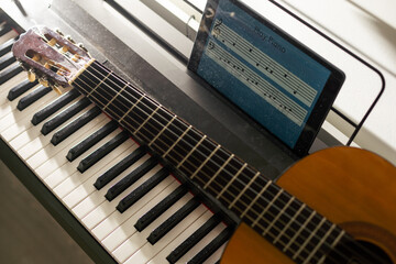 learning music or musical instrument online using tablet at home, persuing hobby