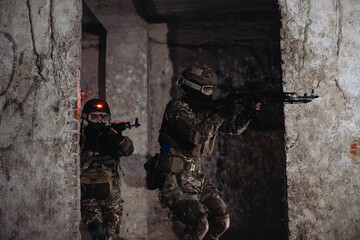 Fototapeta premium Ukrainian soldiers on the battlefield. Special forces are conducting a combat operation.
