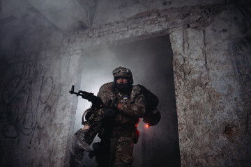 Evacuation of a wounded soldier. A soldier carries his wounded brother in arms from the battlefield.
