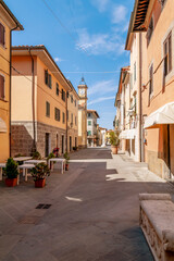 Fototapeta na wymiar The main street in the old town of Ponsacco, Pisa, Italy, without people on a sunny day