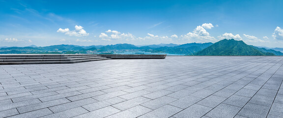 Empty square platform and green mountain with sky cloud landscape